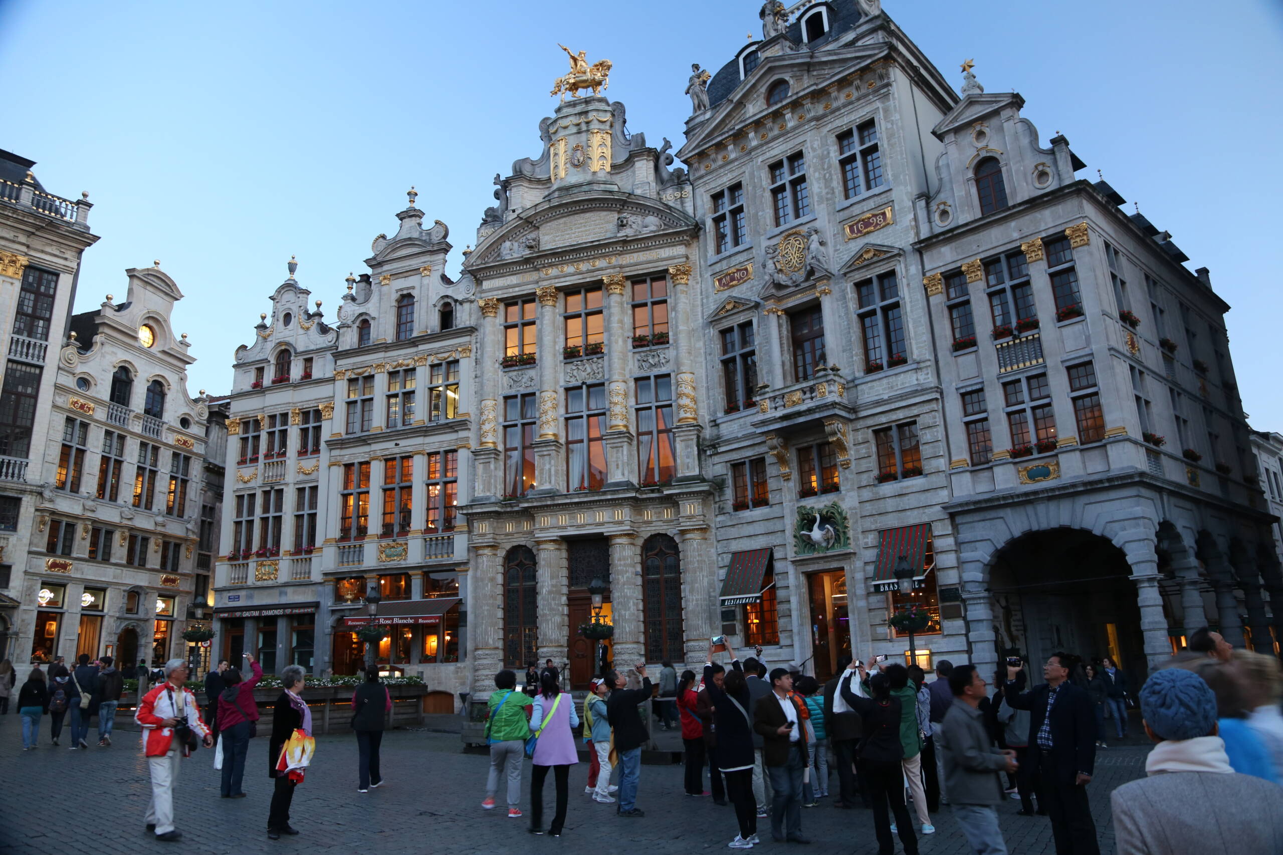Grand-Place at Dusk: Gold, Stone, and the Gathering of Travelers