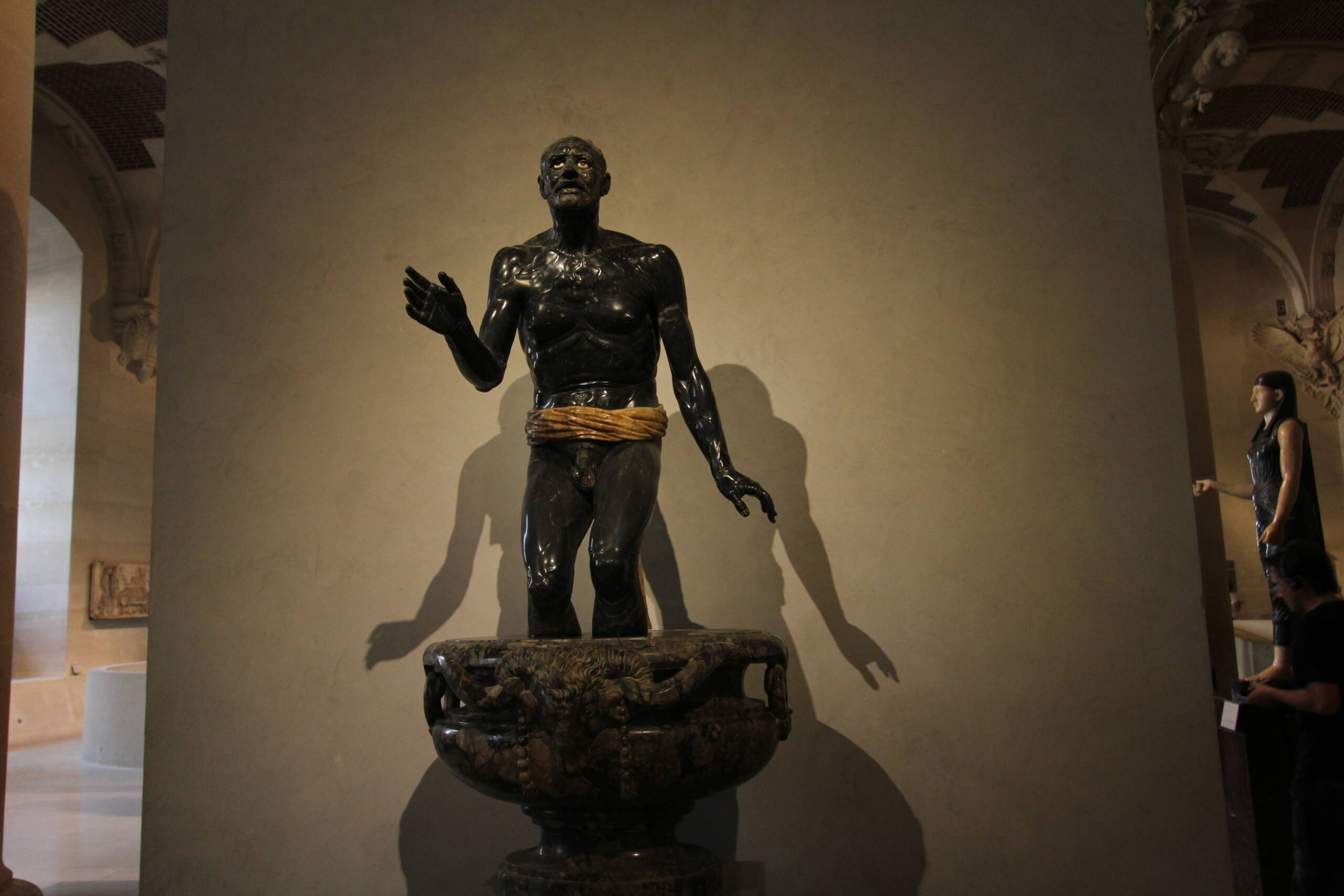 Shadows of Defeat: The Black Marble Captive in the Louvre