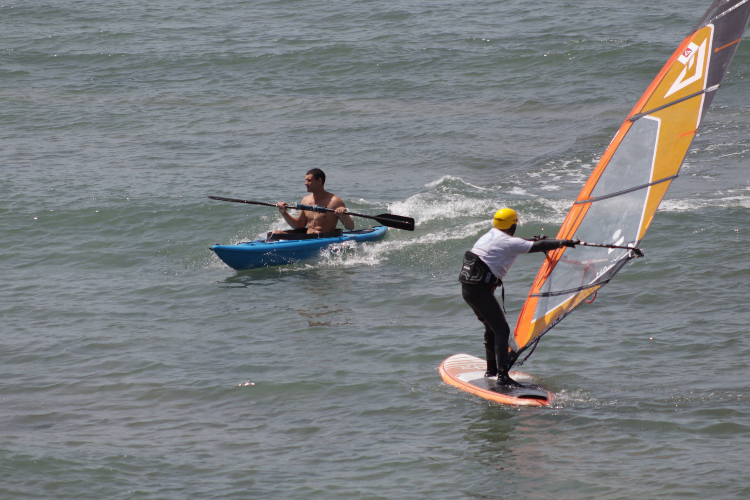 Kayaks and Sails: Two Ways to Dance with the Sea